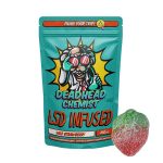 Deadhead Chemist LSD infused gummy bear pouch in teal standing beside a sugar-coated red gummy bear