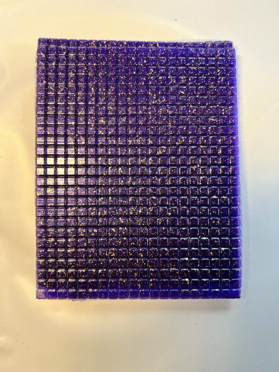 Full sheet of purple pyramid buy LSD gel tabs infused with sparkling gold flakes laid out on a clean surface Full sheet of purple pyramid buy LSD gel tabs infused with sparkling gold flakes laid out on a clean surface