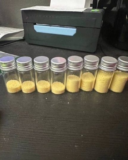 High purity buy 5 Meo DMT crystals freebase formulation displayed in an airtight amber laboratory glass vial