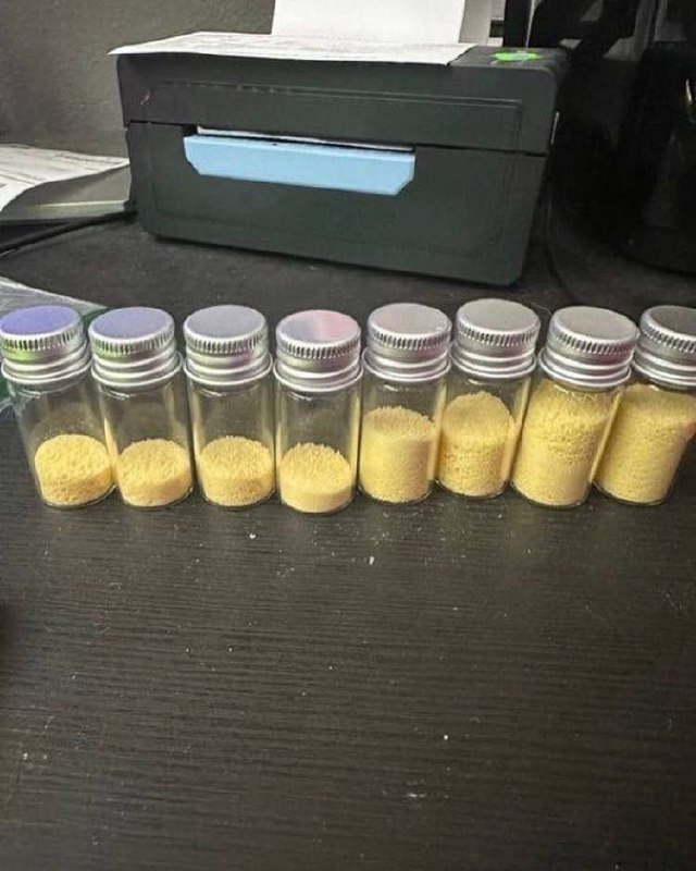 High purity buy 5 Meo DMT crystals freebase formulation displayed in an airtight amber laboratory glass vial High purity buy 5 Meo DMT crystals freebase formulation displayed in an airtight amber laboratory glass vial
