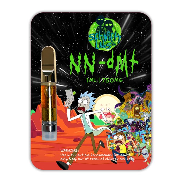 Authentic blister packaging displaying a 1mL Schwifty 750mg DMT cartridge with golden liquid extract and metallic gold mouthpiece Authentic blister packaging displaying a 1mL Schwifty 750mg DMT cartridge with golden liquid extract and metallic gold mouthpiece